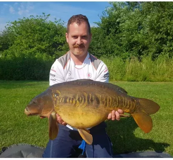 Shane Stanford, Fishing Again Shane Stanford with a large mirror carp